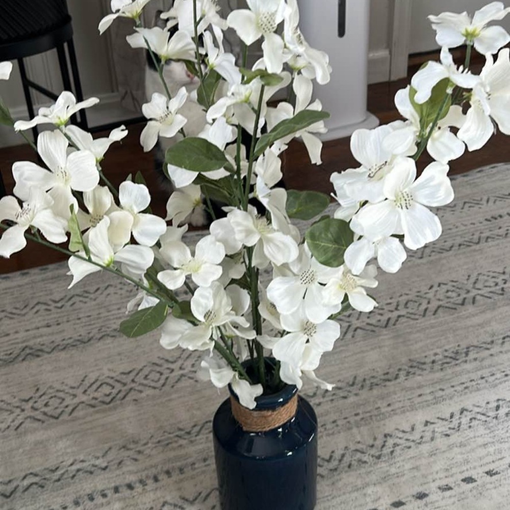 Elegant White Floral Arrangement in Blue Vase and Green floral arrangement